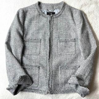 ニジュウサンク(23区)の美品 23区ツイード ノーカラー ジャケット グレー ラメ サイズ40(ノーカラージャケット)