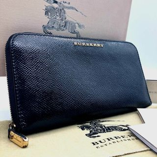 バーバリー(BURBERRY)の【箱・袋・カード付き】バーバリー　長財布　ラウンドジップ　パテントレザー　黒　金(長財布)