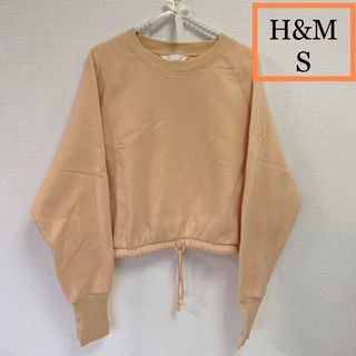 エイチアンドエム(H&M)の【H&M】クロップドスウェットウエスト絞り紐付き　パステルオレンジ　レディースS(トレーナー/スウェット)