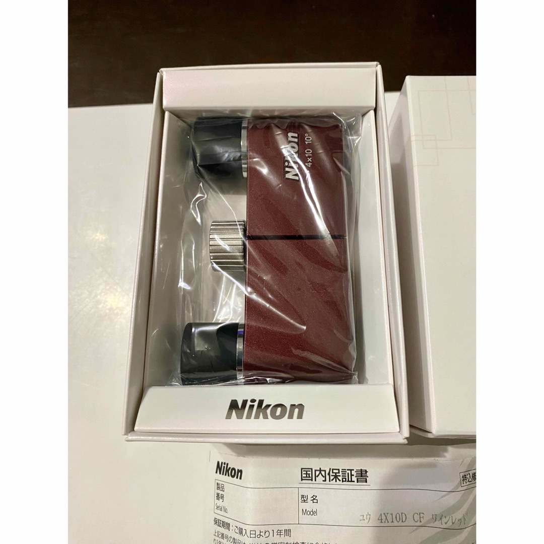 Nikon(ニコン)の新品✨Nikon 双眼鏡  ワインレッド4×10DCFダハプリズム式 スマホ/家電/カメラのスマホ/家電/カメラ その他(その他)の商品写真