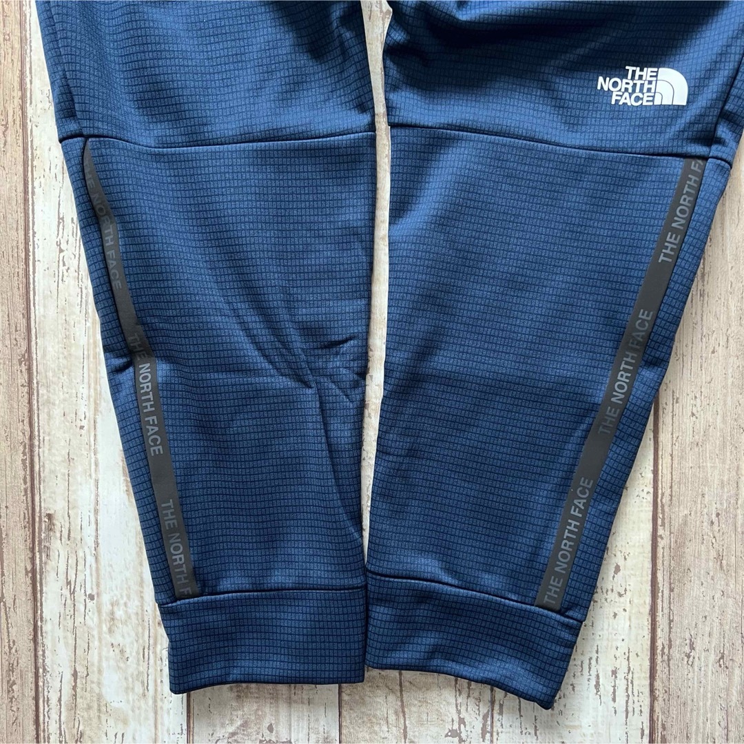 THE NORTH FACE(ザノースフェイス)の【海外限定】TNF ジョガーパンツ　くすみ青　メンズ  Lサイズ メンズのパンツ(その他)の商品写真