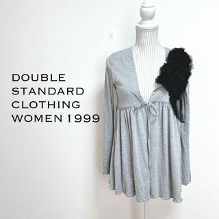 ダブルスタンダードクロージング(DOUBLE STANDARD CLOTHING)のダブルスターンダードクロージング　コサージュ付きカーディガン　ドレープ感(カーディガン)