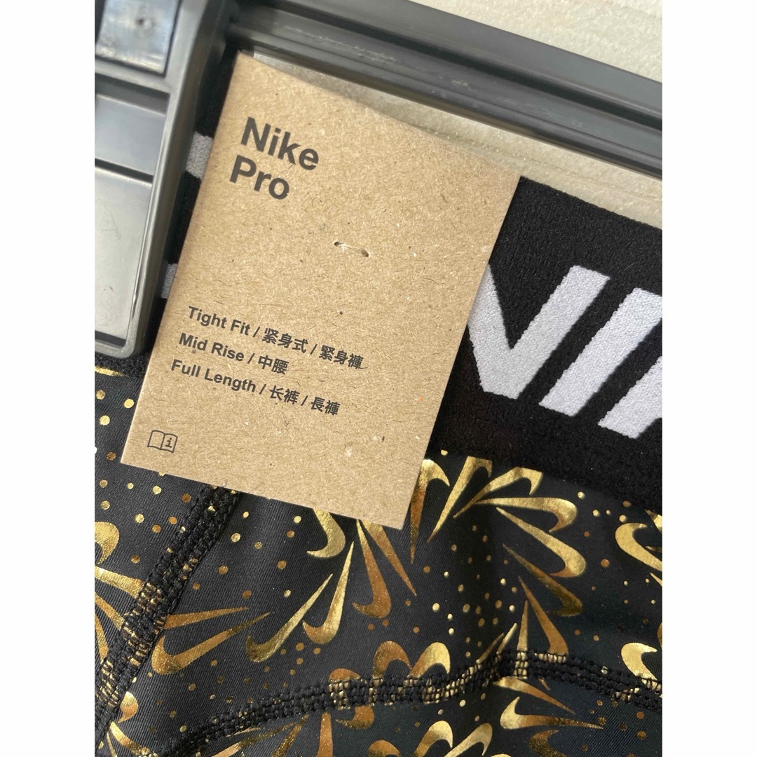 NIKE(ナイキ)のL」NIKEナイキ プロ ウィメンズ NP DF MR 7/8 タイツ AOP レディースのレッグウェア(レギンス/スパッツ)の商品写真