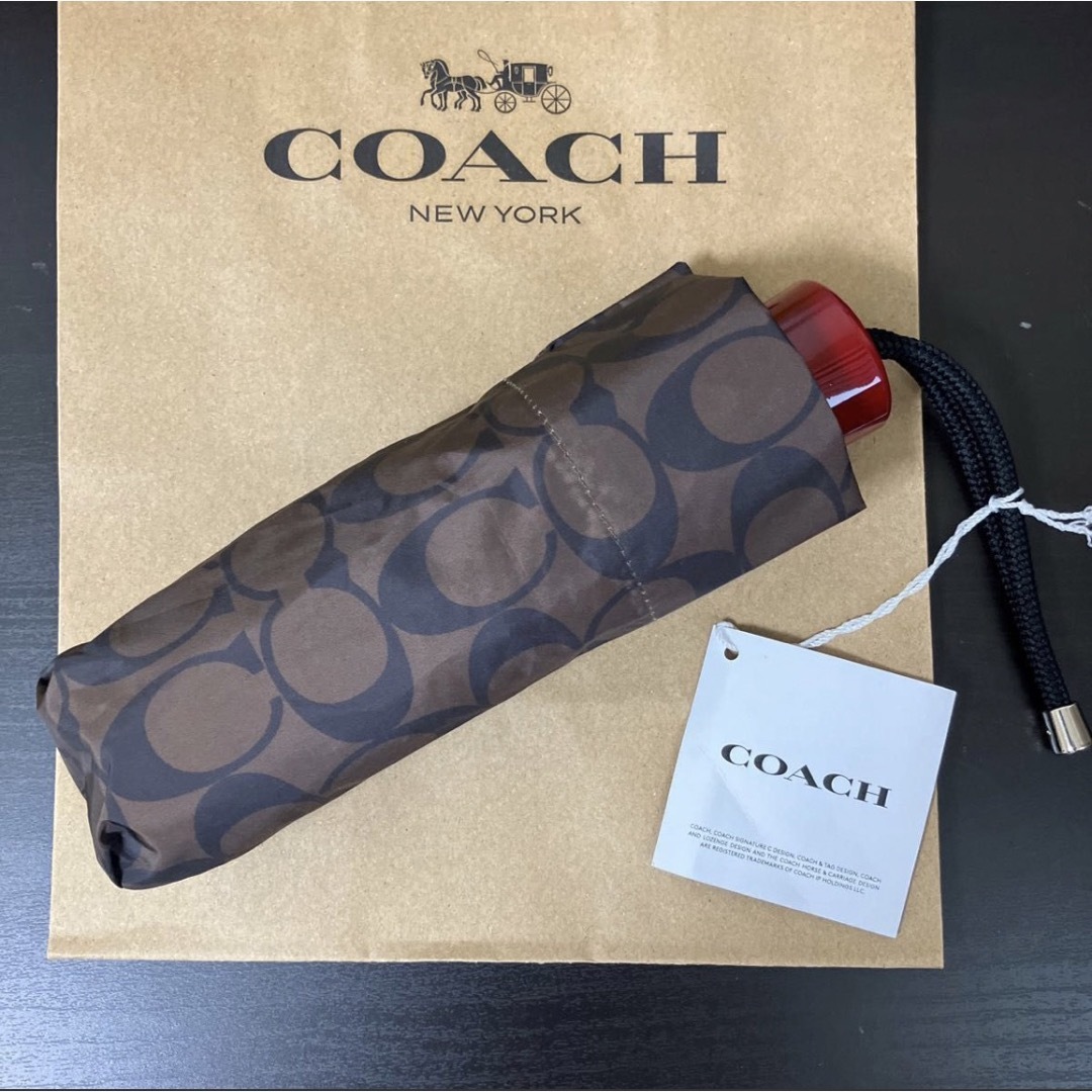 COACH(コーチ)の新品未使用　コーチ　折りたたみ傘　アンブレラ レディースのファッション小物(傘)の商品写真