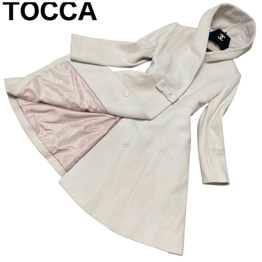 TOCCA(トッカ)のTOCCA ロングコート　フード　フーデッドコート　リボン　比翼　総裏総柄 レディースのジャケット/アウター(ロングコート)の商品写真