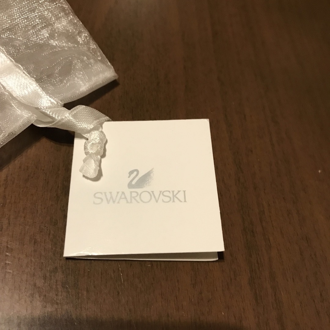 SWAROVSKI(スワロフスキー)の白シースルーのミニ巾着 レディースのファッション小物(ポーチ)の商品写真