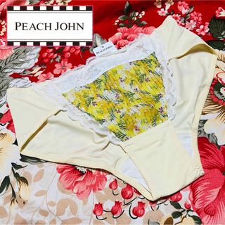 ピーチジョン(PEACH JOHN)のPEACH JOHN★フラワープリーツサニタリーショーツ★パンツ下着yellow(ショーツ)