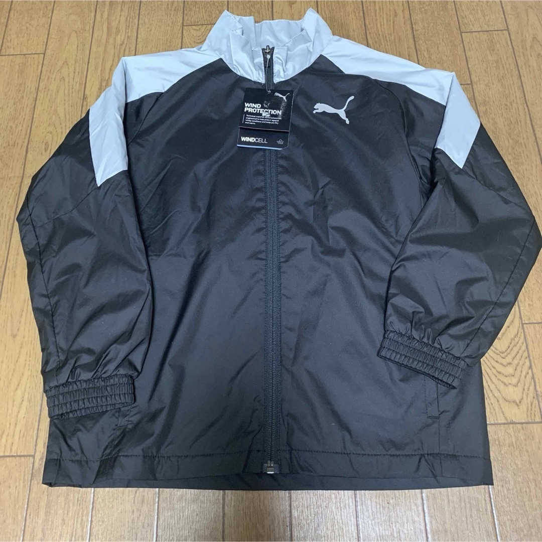 PUMA(プーマ)の新品タグ付き プーマ PUMA ジュニア  130㎝　ウインドブレーカー キッズ/ベビー/マタニティのキッズ服男の子用(90cm~)(ジャケット/上着)の商品写真