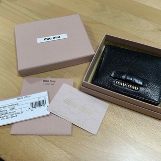 ミュウミュウ(miumiu)のmiumiu 折りたたみ財布 リボン 黒(財布)