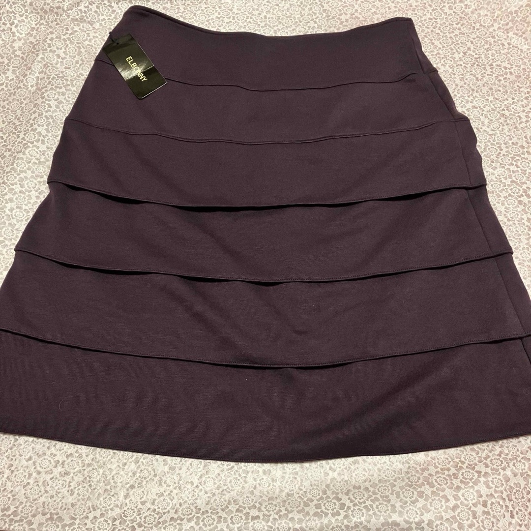 大きいサイズ　ティアード　スカート　紫色系 レディースのスカート(ひざ丈スカート)の商品写真