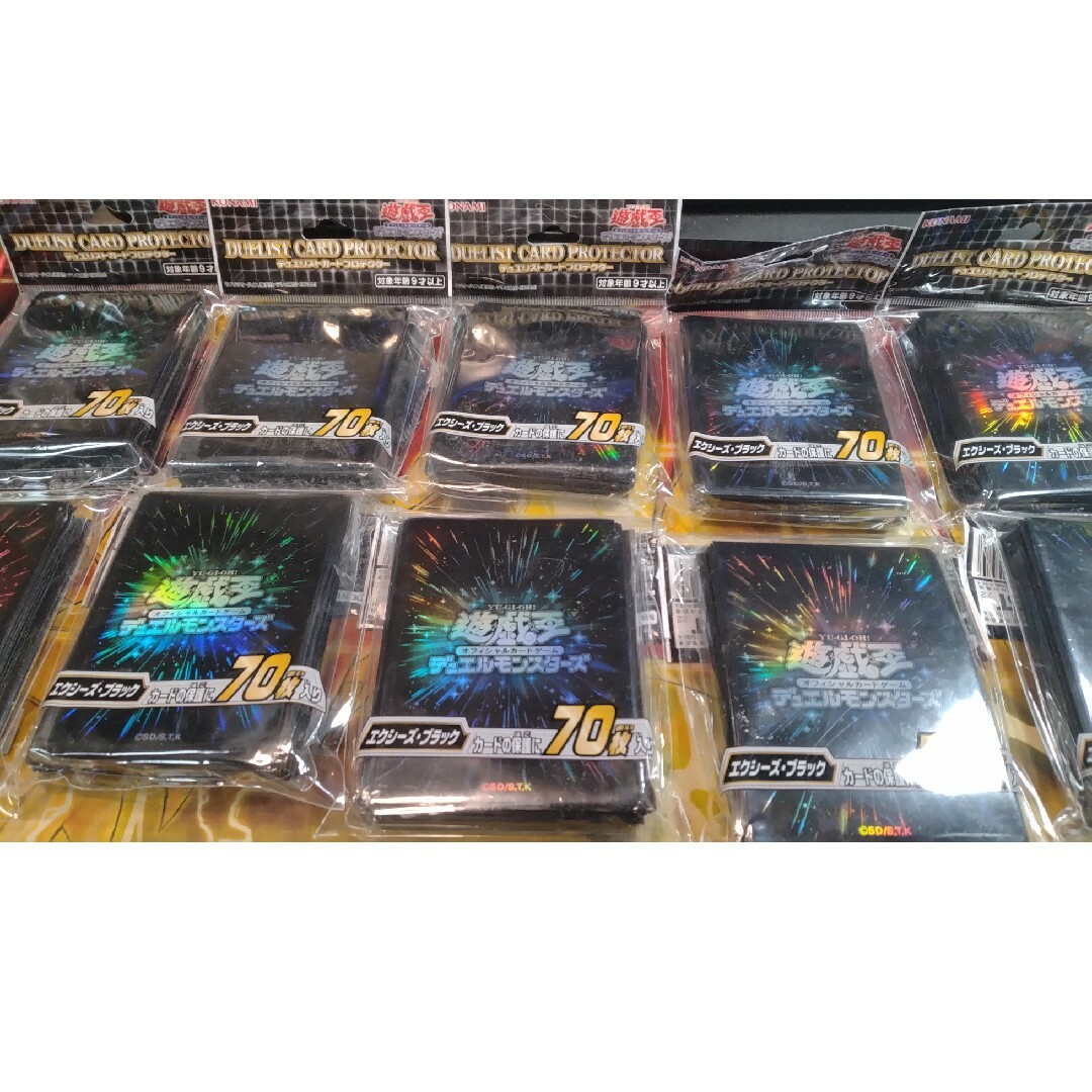 KONAMI(コナミ)の遊戯王公式スリーブ　エクシーズブラック10個 エンタメ/ホビーのトレーディングカード(カードサプライ/アクセサリ)の商品写真