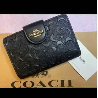 新品　COACH　二つ折り財布　小銭入れ有　シグネチャー　ダークブラウンレディース