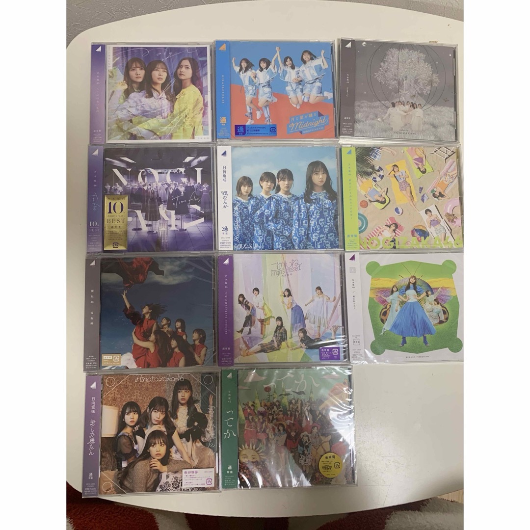 乃木坂46 CD 11枚セット エンタメ/ホビーのタレントグッズ(アイドルグッズ)の商品写真