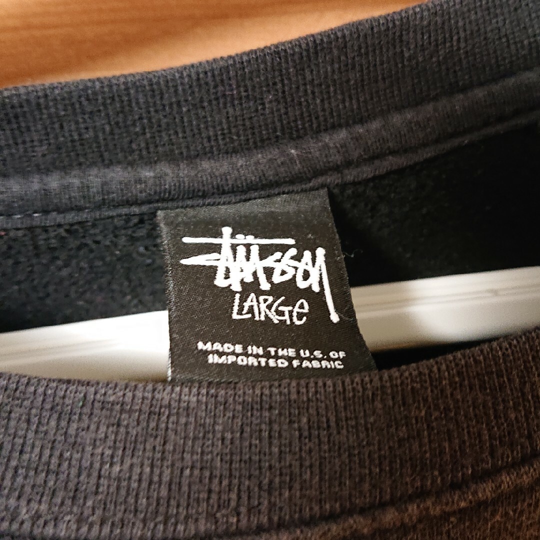 STUSSY(ステューシー)のSTUSSY ステューシーワールドツアープリント裏起毛長袖スウェット ブラック メンズのトップス(スウェット)の商品写真