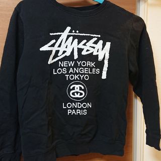 ステューシー(STUSSY)のSTUSSY ステューシーワールドツアープリント裏起毛長袖スウェット ブラック(スウェット)