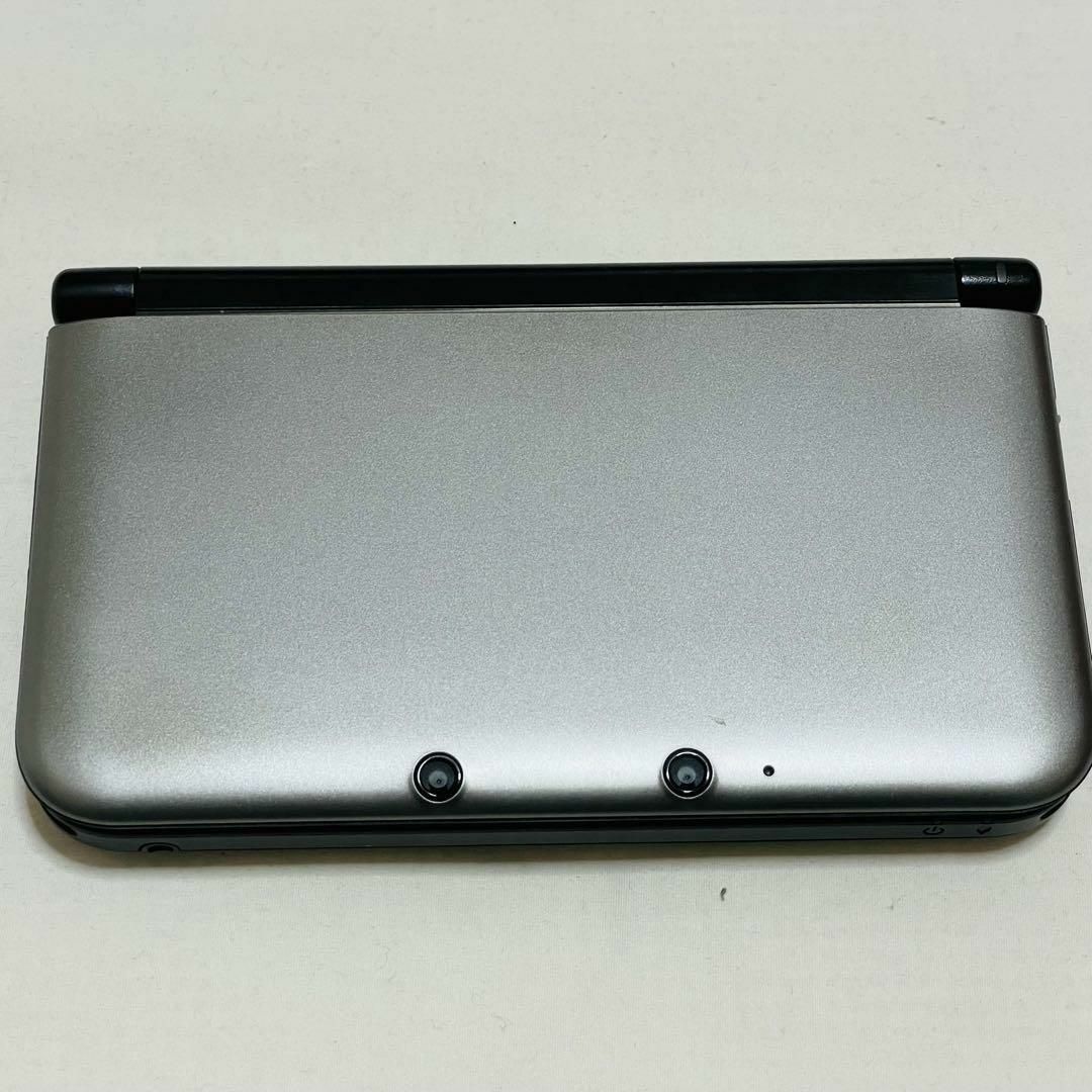 ニンテンドー3DS(ニンテンドー3DS)のニンテンドー3DS LL シルバー×ブラック 動作確認済み 良品 エンタメ/ホビーのゲームソフト/ゲーム機本体(携帯用ゲーム機本体)の商品写真