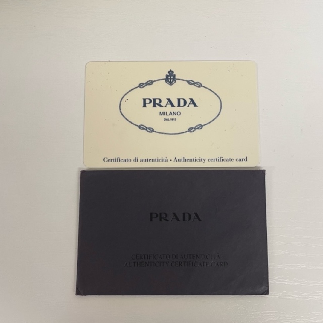 PRADA プラダ ショルダーバッグ 斜め掛け マチ無し 三角プレート 三角ロゴ 白タグ ブラック 黒 ナイロン レディース メンズ USED汚れスレ金具部分