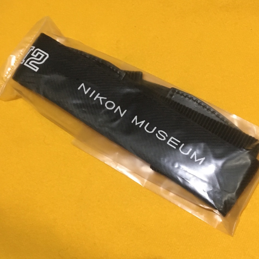 Nikon(ニコン)のNIKON 600本限定 ニコンFM2 40周年記念 ストラップ 未開封新品 スマホ/家電/カメラのカメラ(デジタル一眼)の商品写真