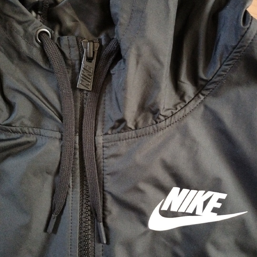 NIKE(ナイキ)の【NIKE/ナイキ】ウーブンジャケット　レディス＜XL>　ホワイト＆ブラック レディースのジャケット/アウター(ナイロンジャケット)の商品写真