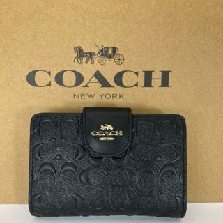 コーチ(COACH)の新品　COACH 二つ折り財布　ブラック　シグネチャー　ワンポイント　小銭入れ有(財布)