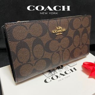 コーチ(COACH)のギフト⭕️ コーチ スリム　長財布　人気のブラウン　手帳型　二つ折り　男女兼用(長財布)