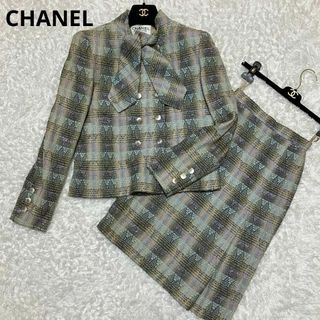 シャネル(CHANEL)のCHANEL ツイード　セットアップ　ボウタイ　ダブル　プリーツ　スカート　36(スーツ)