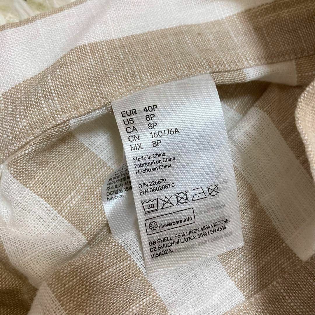 H&M(エイチアンドエム)の未使用品　H&M エイチアンドエム　リネン　ひざ丈　スカート　ストライプ　ベージ レディースのスカート(ひざ丈スカート)の商品写真