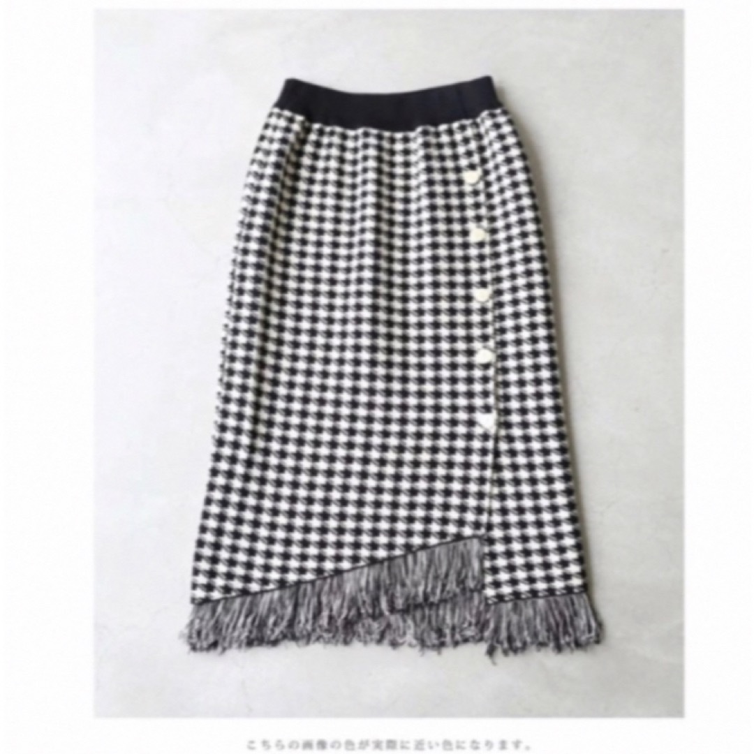 cawaii(カワイイ)の【新品タグ付き】フリンジ揺れるアシンメトリー裾のニットミディアムスカート レディースのスカート(ロングスカート)の商品写真