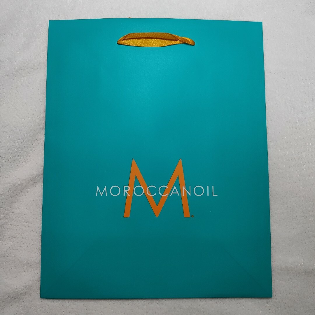 Moroccan oil(モロッカンオイル)の【新品】モロッカンオイル トリートメント 100mL + 25mL ポンプ付き コスメ/美容のヘアケア/スタイリング(トリートメント)の商品写真