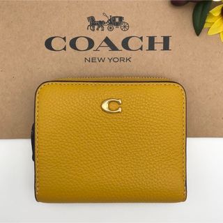 コーチ(COACH) 財布(レディース)（イエロー/黄色系）の通販 300点以上