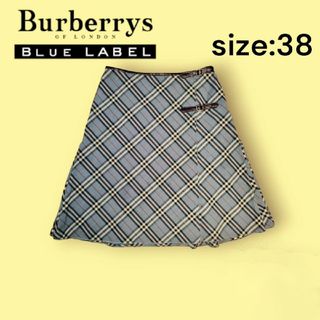 バーバリーブルーレーベル(BURBERRY BLUE LABEL)のBURBERRY BLUE LABEL ラップスカート 膝丈 ノバチェック 水色(ひざ丈スカート)