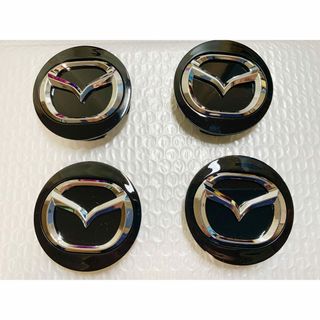 マツダ(マツダ)のマツダ MAZDA 4個　ホイール センターキャップ　外径56MM ブラック(車外アクセサリ)