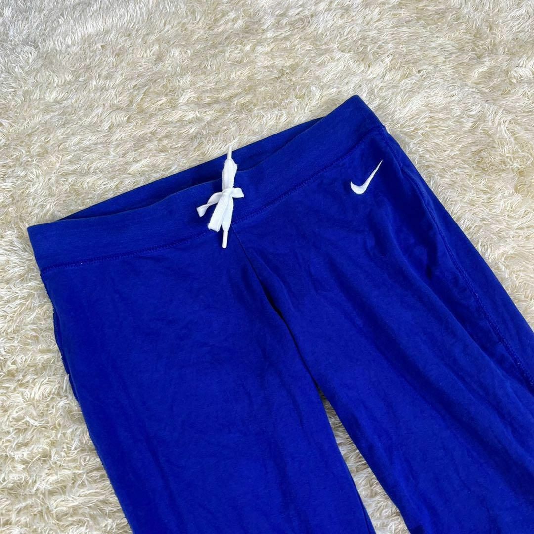 NIKE(ナイキ)のNIKE ナイキ (M) 7分丈 スポーツ トレーニング パンツ ブルー レディースのパンツ(カジュアルパンツ)の商品写真