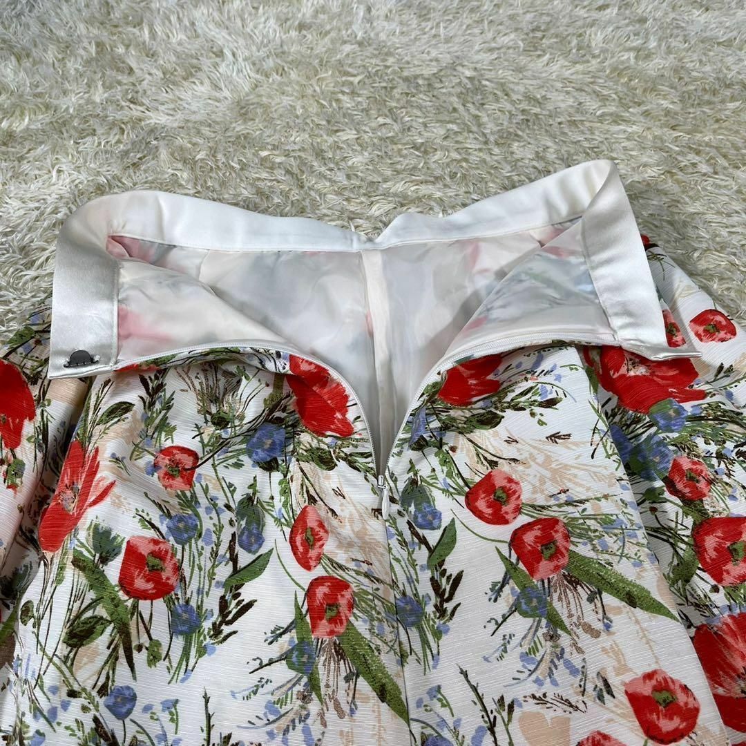 ecruefil(エクリュフィル)のecruefil (S) 総柄 花柄 フレアスカート バッグファスナー ホワイト レディースのスカート(ひざ丈スカート)の商品写真