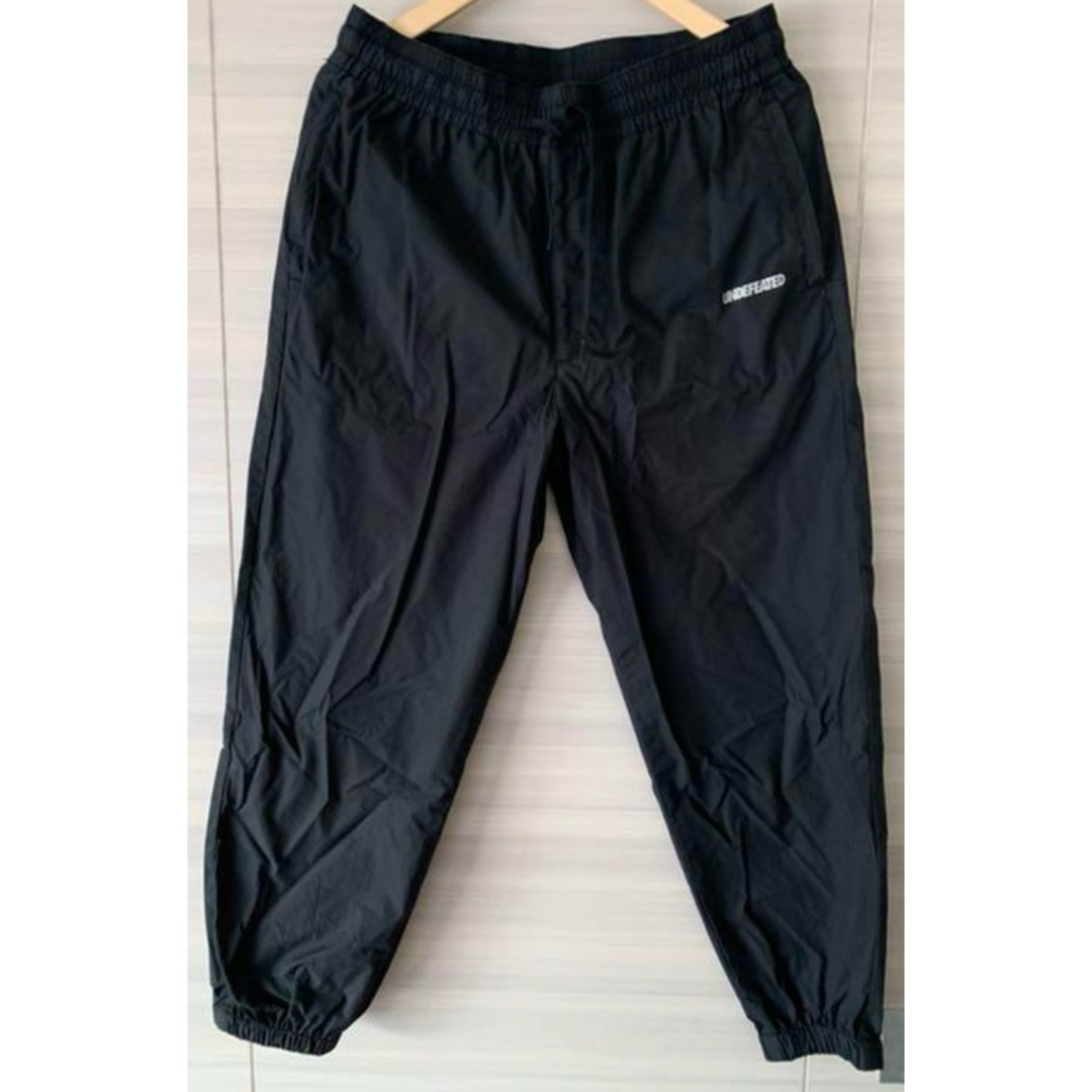 UNDEFEATED(アンディフィーテッド)のUNDEFEATED TRAINING PANTS - JP20002 メンズのパンツ(その他)の商品写真