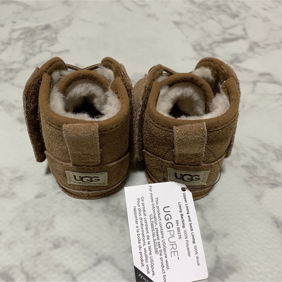 UGG(アグ)のUGG アグ ベビーブーツ 新品未使用タグ付き キッズ/ベビー/マタニティのベビー靴/シューズ(~14cm)(ブーツ)の商品写真