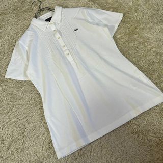 ラコステ(LACOSTE)のLACOSTE ラコステ (XL) ロゴ入り プリーツ ポロシャツ ホワイト(ポロシャツ)