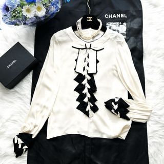 シャネル(CHANEL)の美品　CHANEL シャネル　シルク　おリボン　折り紙　ブラウス　フリル　シャツ(シャツ/ブラウス(長袖/七分))