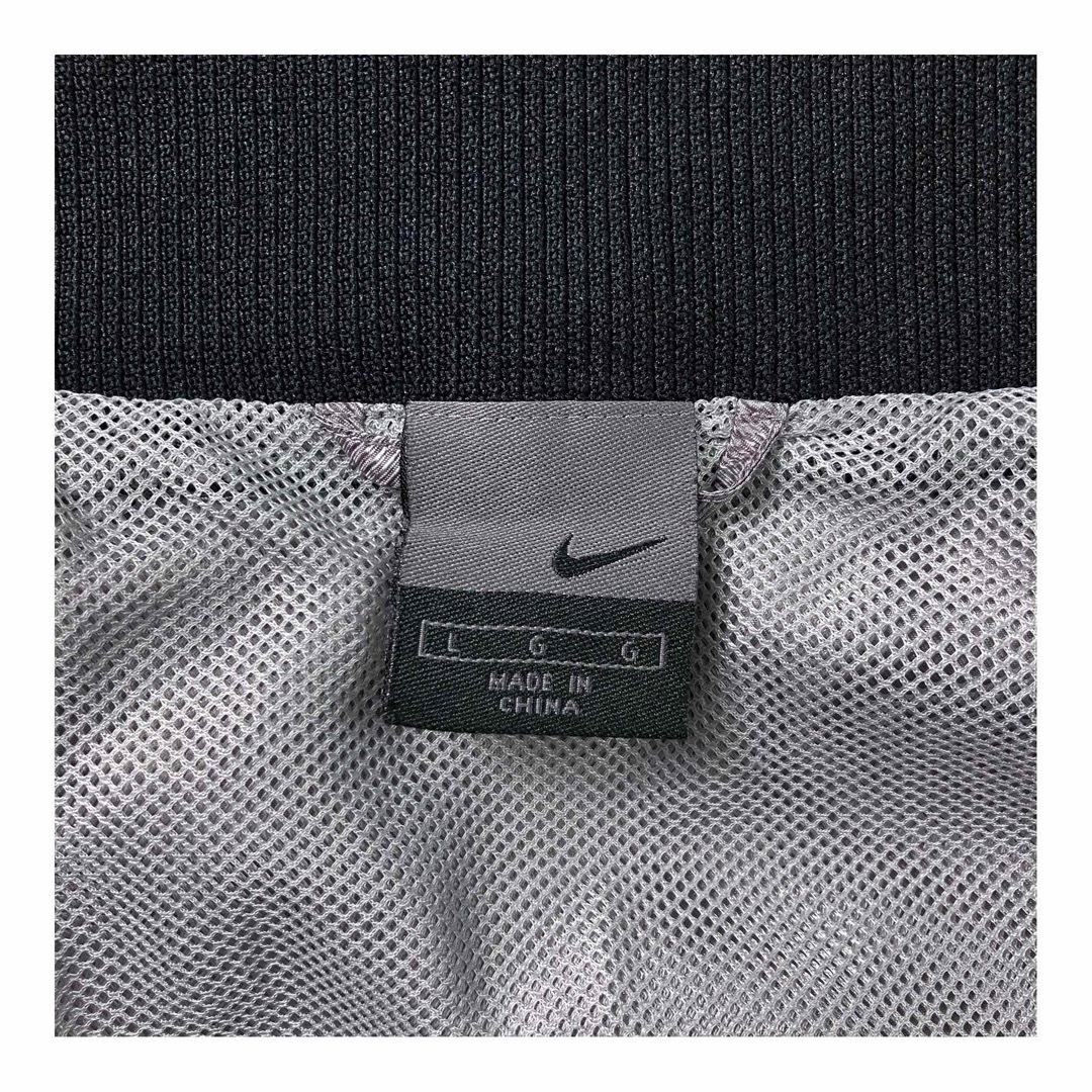 NIKE(ナイキ)の00s NIKE ナイキ フーデッドトラックジャケット リフレクター シルバー メンズのトップス(ジャージ)の商品写真