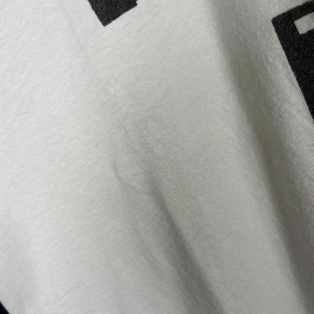 VINTAGE(ヴィンテージ)の[古着]ビンテージ　長袖　Tシャツ　ロンT　プリント　ラグラン　黒　白　Y2K メンズのトップス(Tシャツ/カットソー(七分/長袖))の商品写真