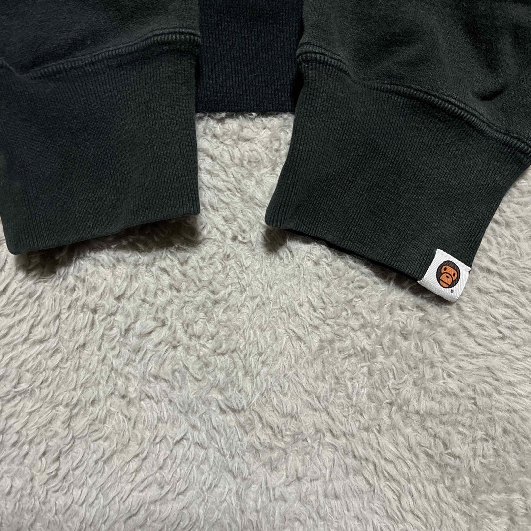 A BATHING APE(アベイシングエイプ)のAPE BAPE KAWS BABY MILO パーカー　スウェット　M 黒 メンズのトップス(パーカー)の商品写真