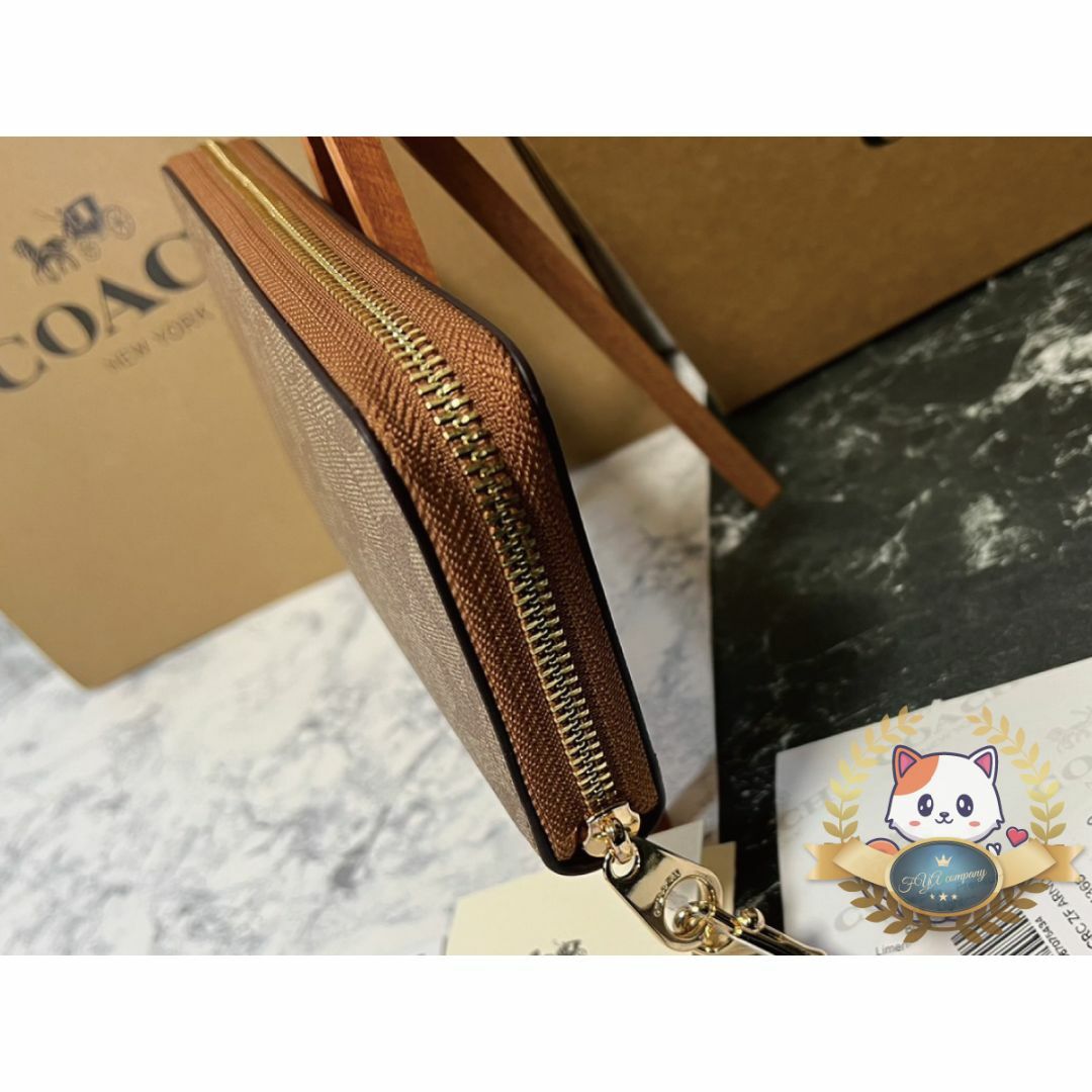 COACH(コーチ)のコーチ シグネチャー  ロング ジップアラウンド ウォレット おまけ付き レディースのファッション小物(財布)の商品写真