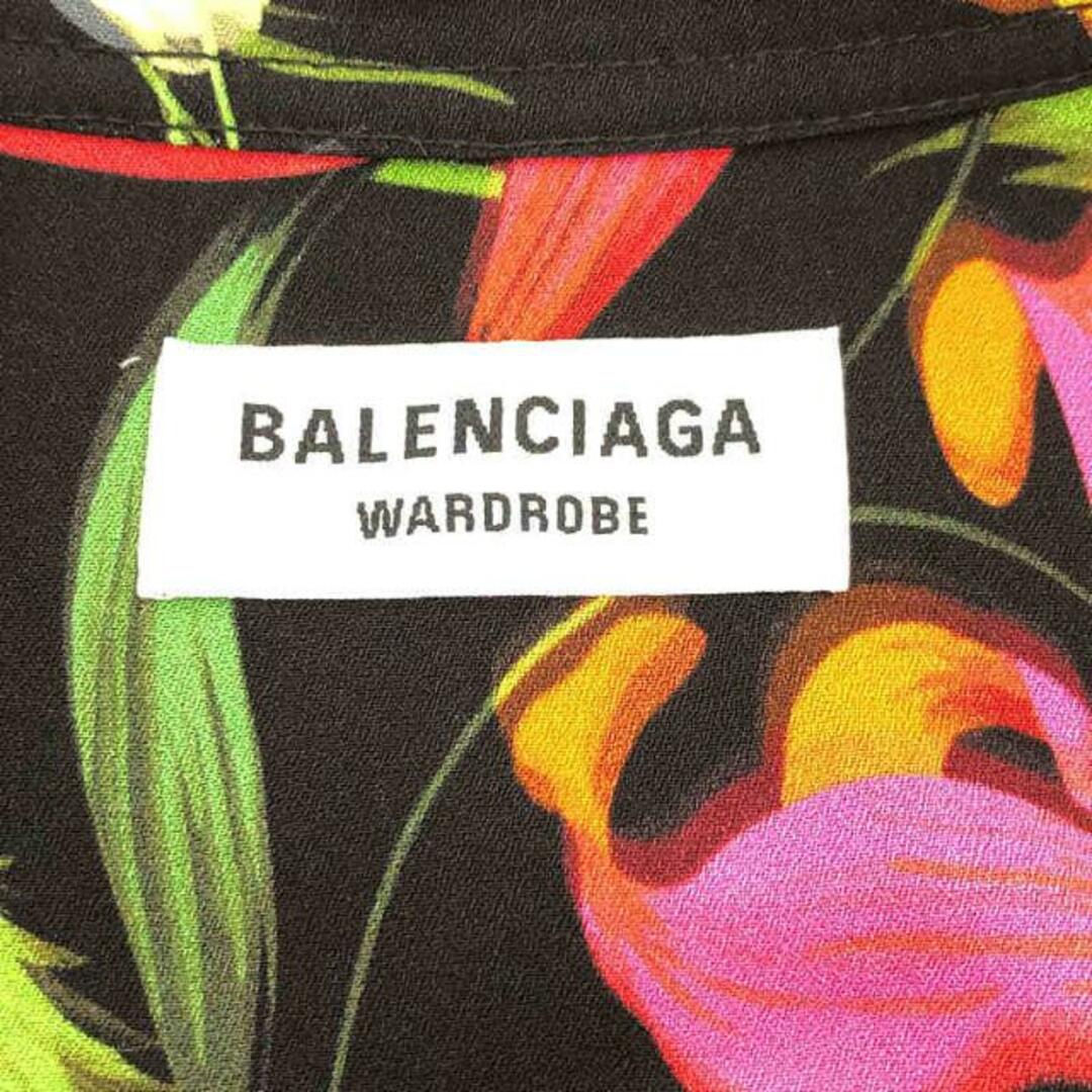 Balenciaga(バレンシアガ)の【新品】  BALENCIAGA / バレンシアガ | 2022SS | 総柄 フラワー リボン タイ レーヨン オーバー ロングシャツ ブラウス | 34 | ブラック/マルチカラー | レディース レディースのトップス(シャツ/ブラウス(長袖/七分))の商品写真