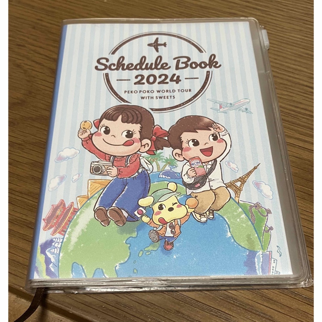 不二家(フジヤ)の【新品・未使用品】 不二家 ペコちゃん スケジュール手帳 インテリア/住まい/日用品の文房具(カレンダー/スケジュール)の商品写真