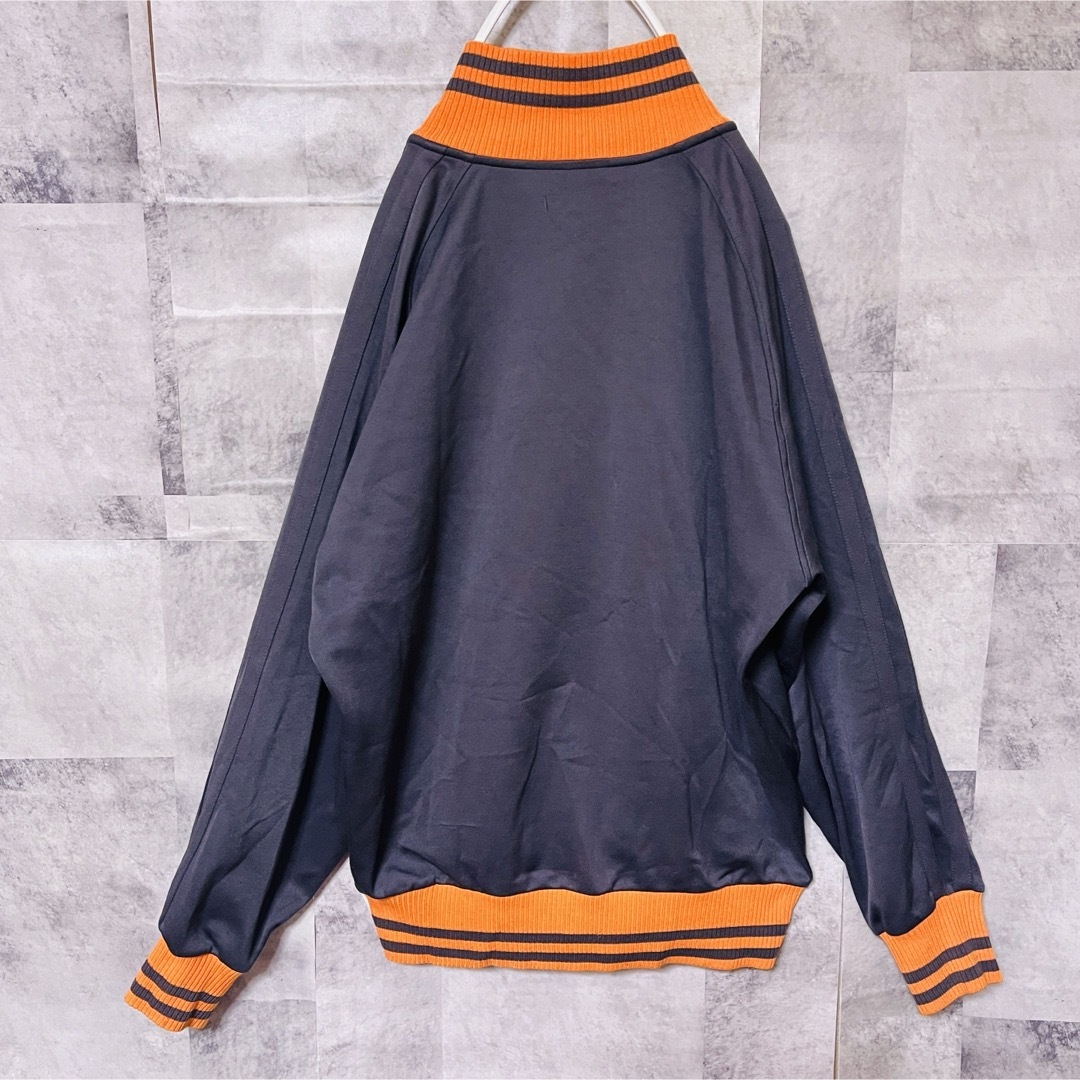 PUMA(プーマ)のプーマジャージ上　トラックジャケット　ヒットユニオン　刺繍Lグレー×オレンジ メンズのトップス(ジャージ)の商品写真