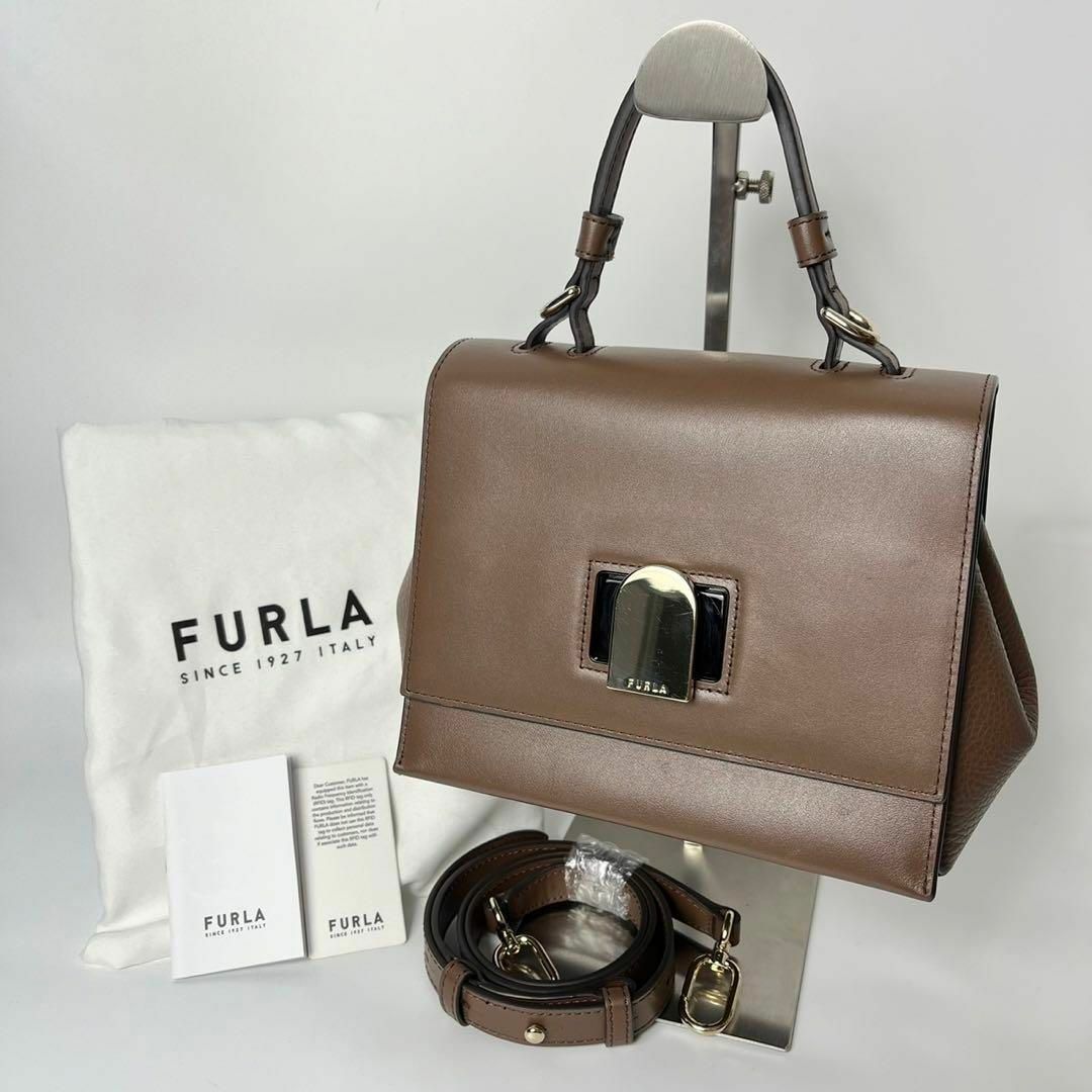 Furla(フルラ)の【美品・保存袋付】フルラ　エマ　トップハンドル　2wayハンドバッグ　ブラウン レディースのバッグ(ハンドバッグ)の商品写真