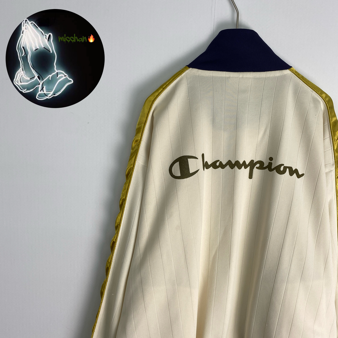 Champion(チャンピオン)の【チャンピオン　トラックジャケット　バックプリント　アイボリー　ネイビー　古着】 メンズのジャケット/アウター(その他)の商品写真