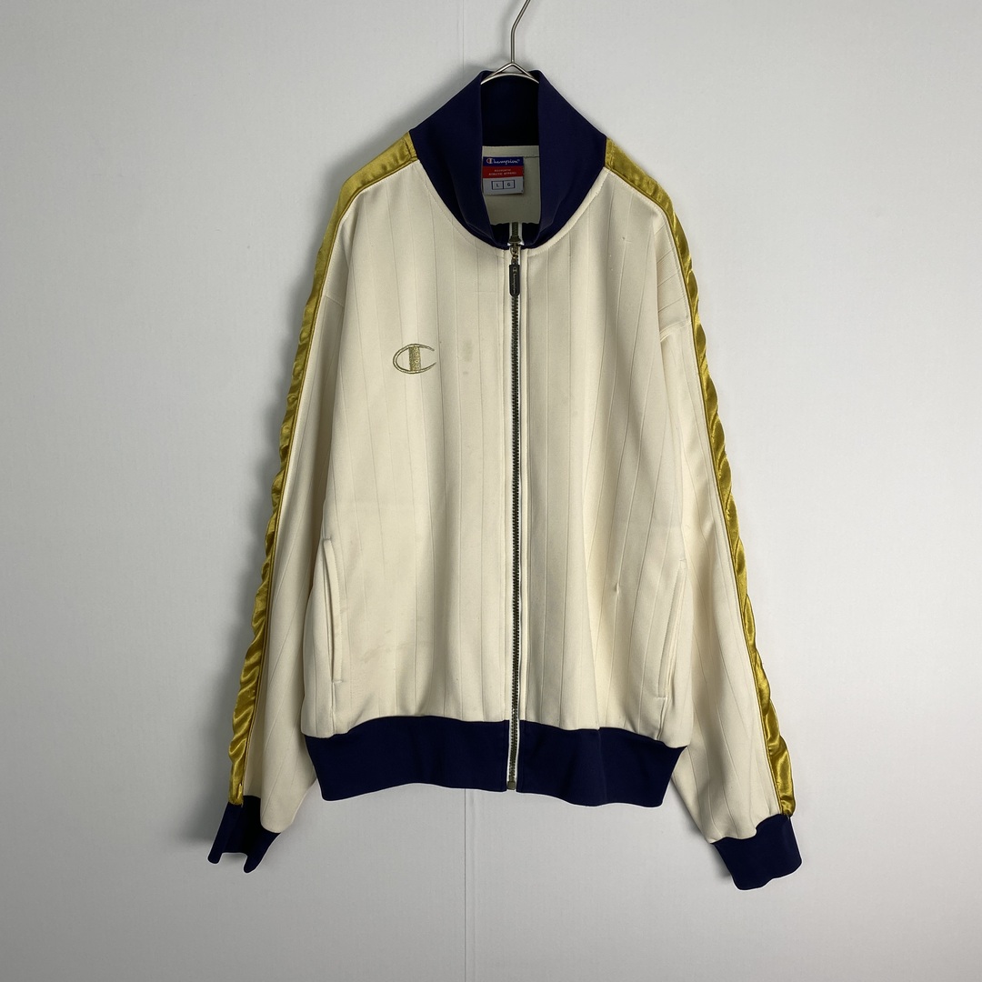 Champion(チャンピオン)の【チャンピオン　トラックジャケット　バックプリント　アイボリー　ネイビー　古着】 メンズのジャケット/アウター(その他)の商品写真