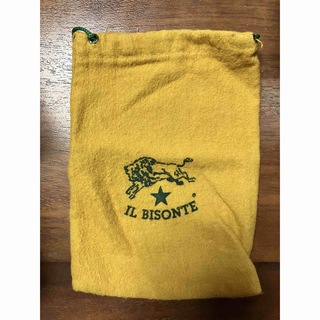 イルビゾンテ(IL BISONTE)のイルビゾンテ　巾着　黄色　マスタード　財布(ポーチ)