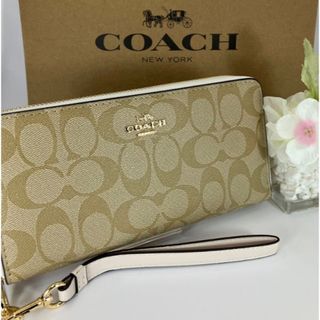 コーチ(COACH)の新品　COACH 長財布　シグネチャー　ベージュ　ラウンドファスナー　小銭入れ有(財布)